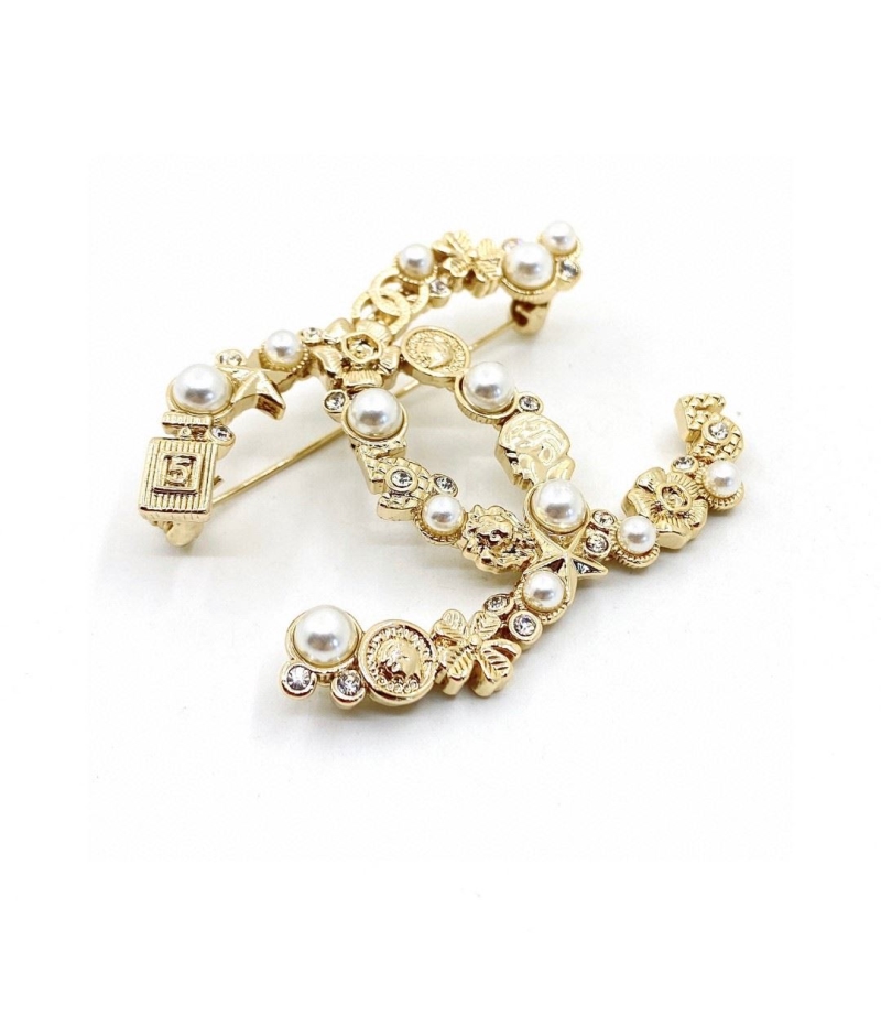 Ch**el brooches